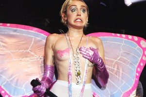 Shock! Miley Cyrus wears a strange shirt that only covers her nipples with a fluttering butterfly