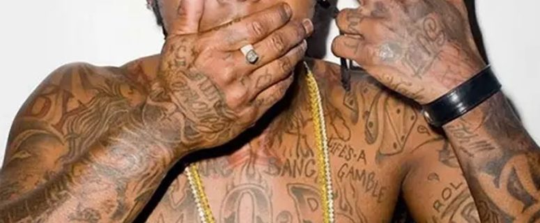 Lil Wayne’s Face Tattoos: Hidden Messages Cracked by Tattoo Artist?