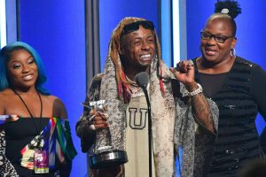 DJ Khaled Makes Personal Delivery of “I Am Hip-Hop” Award to Lil Wayne at BET